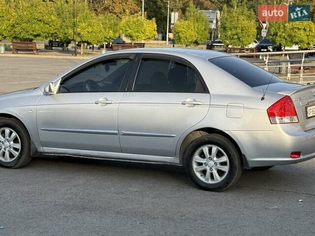 Серый Киа Черато, объемом двигателя 2 л и пробегом 202 тыс. км за 4850 $, фото 1 на Automoto.ua