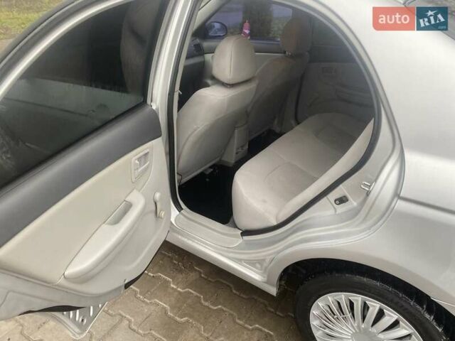 Сірий Кіа Черато, об'ємом двигуна 1.59 л та пробігом 250 тис. км за 4500 $, фото 8 на Automoto.ua