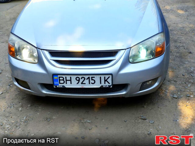 Серый Киа Черато, объемом двигателя 2 л и пробегом 186 тыс. км за 5800 $, фото 1 на Automoto.ua