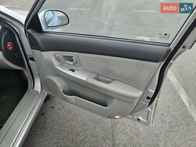 Серый Киа Черато, объемом двигателя 1.6 л и пробегом 197 тыс. км за 4300 $, фото 14 на Automoto.ua