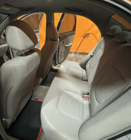 Серый Киа Черато, объемом двигателя 1.6 л и пробегом 274 тыс. км за 3500 $, фото 6 на Automoto.ua