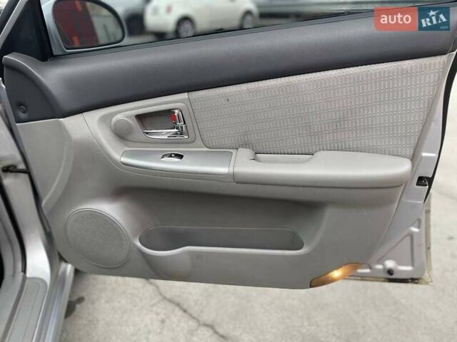 Серый Киа Черато, объемом двигателя 2 л и пробегом 183 тыс. км за 4000 $, фото 20 на Automoto.ua