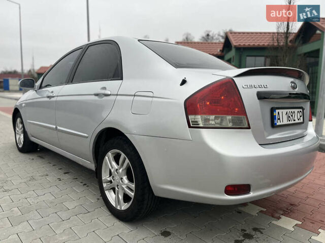 Сірий Кіа Черато, об'ємом двигуна 1.6 л та пробігом 235 тис. км за 3999 $, фото 2 на Automoto.ua