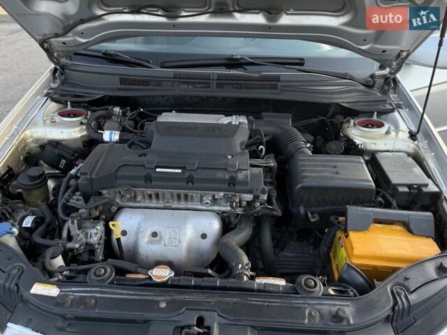 Сірий Кіа Черато, об'ємом двигуна 2 л та пробігом 202 тис. км за 4600 $, фото 29 на Automoto.ua