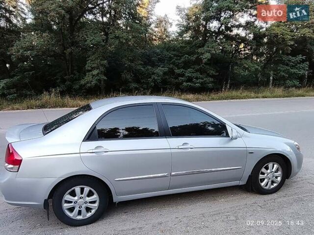 Серый Киа Черато, объемом двигателя 2 л и пробегом 164 тыс. км за 4900 $, фото 7 на Automoto.ua