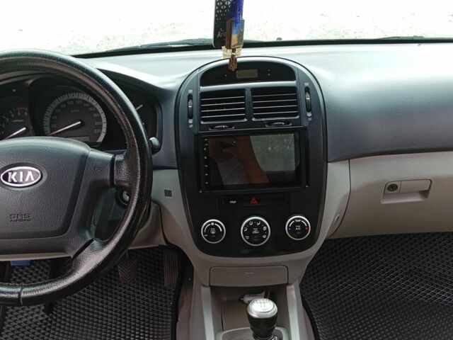 Сірий Кіа Черато, об'ємом двигуна 1.6 л та пробігом 240 тис. км за 5000 $, фото 7 на Automoto.ua