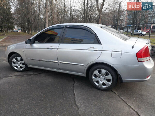 Серый Киа Черато, объемом двигателя 1.6 л и пробегом 250 тыс. км за 3999 $, фото 2 на Automoto.ua