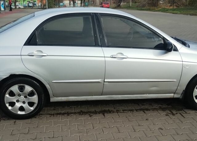 Серый Киа Черато, объемом двигателя 1.6 л и пробегом 296 тыс. км за 3900 $, фото 3 на Automoto.ua