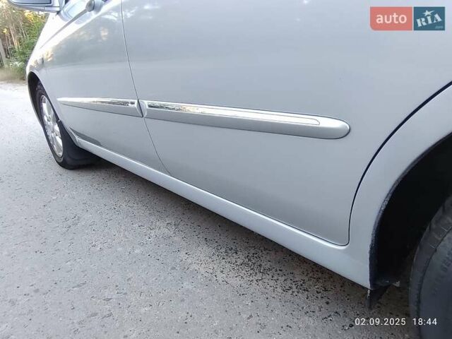 Серый Киа Черато, объемом двигателя 2 л и пробегом 164 тыс. км за 4900 $, фото 3 на Automoto.ua