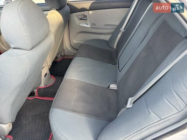 Сірий Кіа Черато, об'ємом двигуна 2 л та пробігом 202 тис. км за 4600 $, фото 37 на Automoto.ua