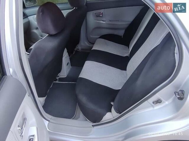 Серый Киа Черато, объемом двигателя 2 л и пробегом 164 тыс. км за 4900 $, фото 4 на Automoto.ua