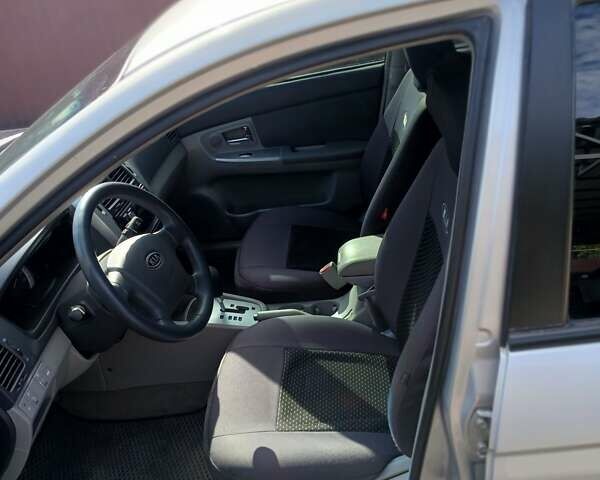 Сірий Кіа Черато, об'ємом двигуна 2 л та пробігом 190 тис. км за 5300 $, фото 1 на Automoto.ua