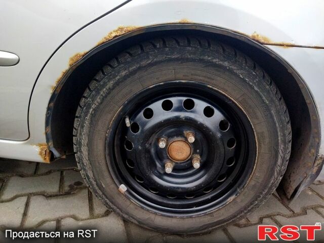 Серый Киа Черато, объемом двигателя 16 л и пробегом 182 тыс. км за 4200 $, фото 7 на Automoto.ua