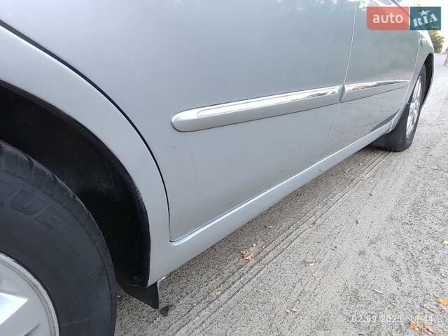 Серый Киа Черато, объемом двигателя 2 л и пробегом 164 тыс. км за 4900 $, фото 5 на Automoto.ua