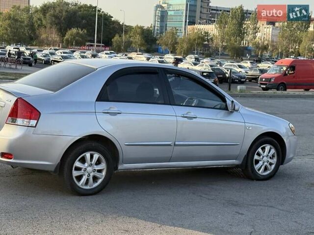 Серый Киа Черато, объемом двигателя 2 л и пробегом 202 тыс. км за 4850 $, фото 2 на Automoto.ua