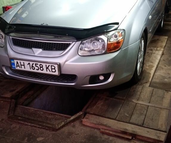 Серый Киа Черато, объемом двигателя 2 л и пробегом 165 тыс. км за 4600 $, фото 1 на Automoto.ua