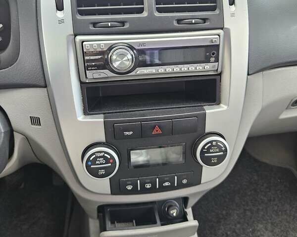 Сірий Кіа Черато, об'ємом двигуна 1.6 л та пробігом 202 тис. км за 4100 $, фото 12 на Automoto.ua