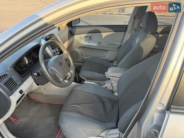 Сірий Кіа Черато, об'ємом двигуна 2 л та пробігом 202 тис. км за 4600 $, фото 31 на Automoto.ua