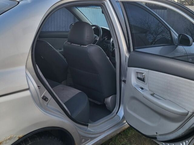 Серый Киа Черато, объемом двигателя 1.6 л и пробегом 326 тыс. км за 2700 $, фото 3 на Automoto.ua