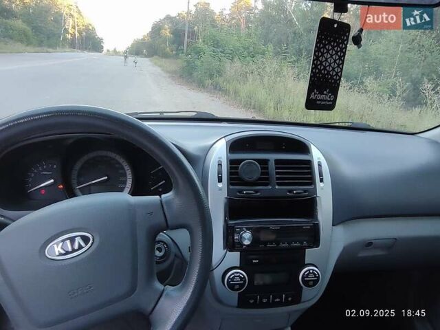 Серый Киа Черато, объемом двигателя 2 л и пробегом 164 тыс. км за 4900 $, фото 2 на Automoto.ua