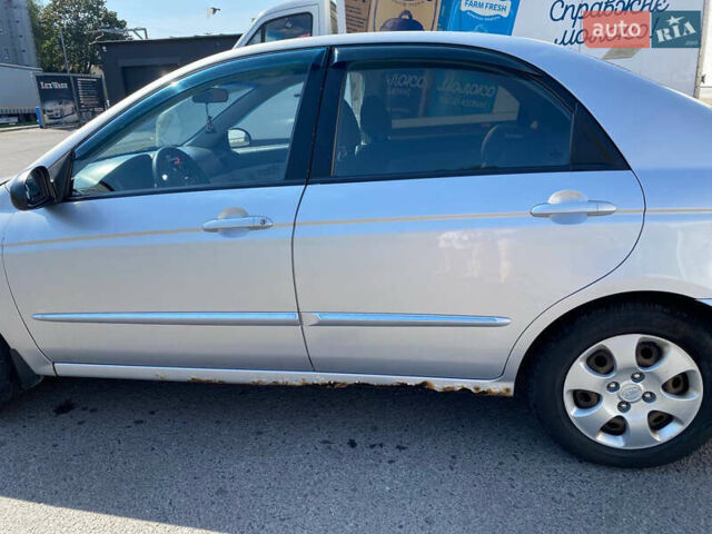 Сірий Кіа Черато, об'ємом двигуна 1.6 л та пробігом 250 тис. км за 3100 $, фото 1 на Automoto.ua