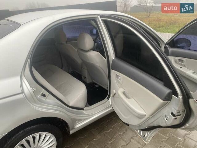 Сірий Кіа Черато, об'ємом двигуна 1.59 л та пробігом 250 тис. км за 4500 $, фото 9 на Automoto.ua