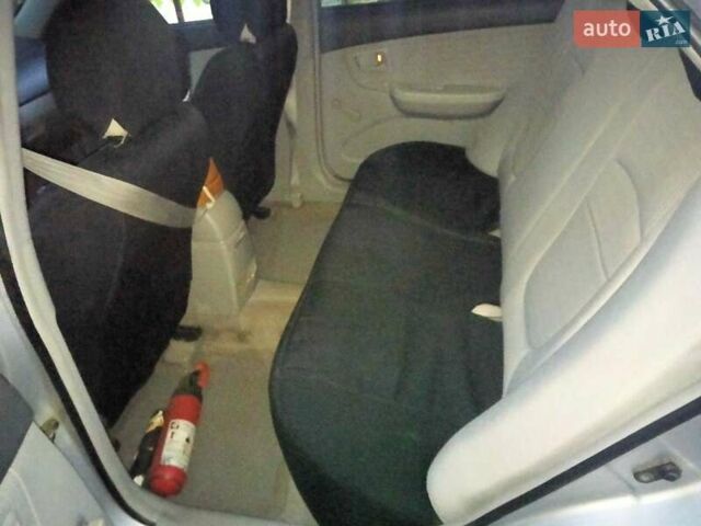 Серый Киа Черато, объемом двигателя 1.58 л и пробегом 170 тыс. км за 4500 $, фото 5 на Automoto.ua