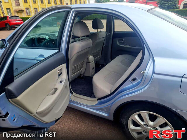 Серый Киа Черато, объемом двигателя 1.6 л и пробегом 265 тыс. км за 4999 $, фото 2 на Automoto.ua