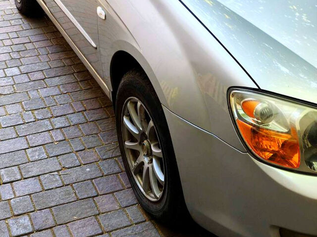 Серый Киа Черато, объемом двигателя 2 л и пробегом 186 тыс. км за 5800 $, фото 2 на Automoto.ua