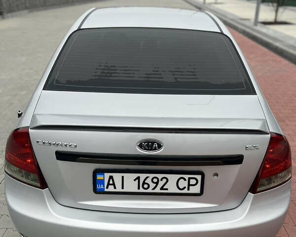 Сірий Кіа Черато, об'ємом двигуна 1.6 л та пробігом 235 тис. км за 3999 $, фото 5 на Automoto.ua