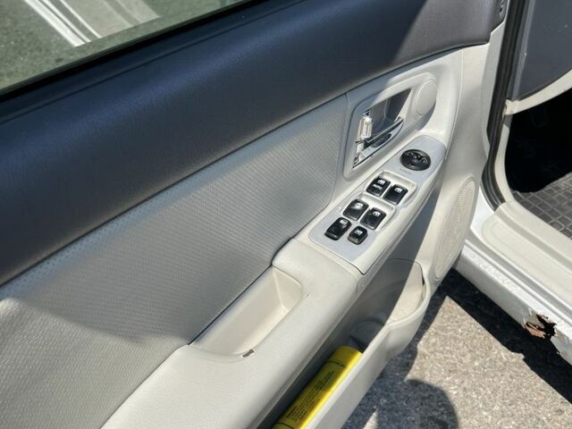 Киа Черато 2007 в Подольск (Котовск) на Automoto.ua Серый Киа Черато, объемом двигателя 1.6 л и пробегом 300 тыс. км за 2500 $, фото 9 на Automoto.ua