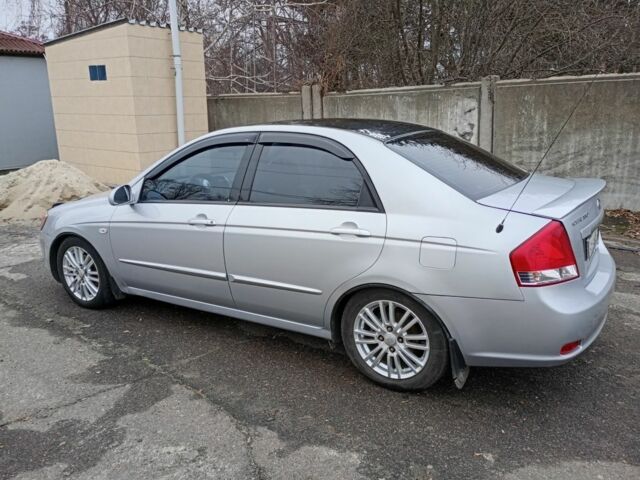 Серый Киа Черато, объемом двигателя 2 л и пробегом 165 тыс. км за 4600 $, фото 5 на Automoto.ua