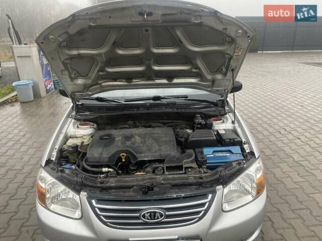Сірий Кіа Черато, об'ємом двигуна 1.59 л та пробігом 250 тис. км за 4500 $, фото 13 на Automoto.ua