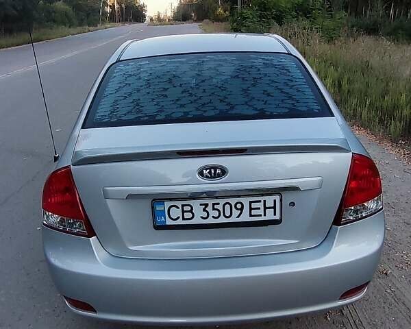 Серый Киа Черато, объемом двигателя 2 л и пробегом 164 тыс. км за 4900 $, фото 8 на Automoto.ua