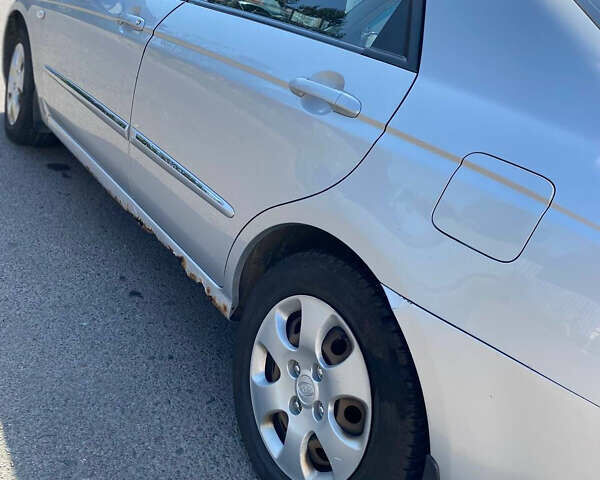 Сірий Кіа Черато, об'ємом двигуна 1.6 л та пробігом 250 тис. км за 3100 $, фото 5 на Automoto.ua