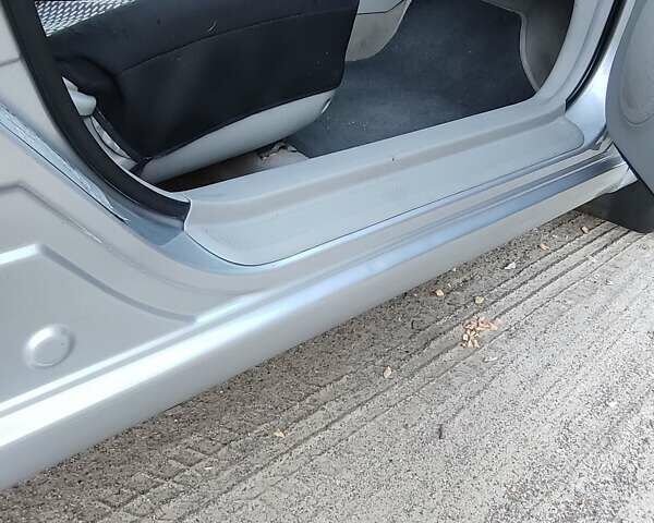 Серый Киа Черато, объемом двигателя 2 л и пробегом 164 тыс. км за 4900 $, фото 13 на Automoto.ua