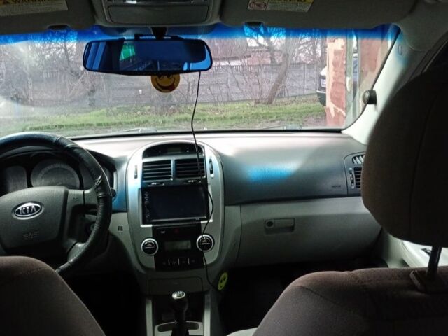 Серый Киа Черато, объемом двигателя 2 л и пробегом 165 тыс. км за 4600 $, фото 6 на Automoto.ua