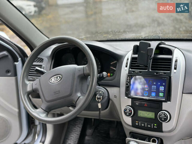 Серый Киа Черато, объемом двигателя 1.58 л и пробегом 495 тыс. км за 3900 $, фото 9 на Automoto.ua