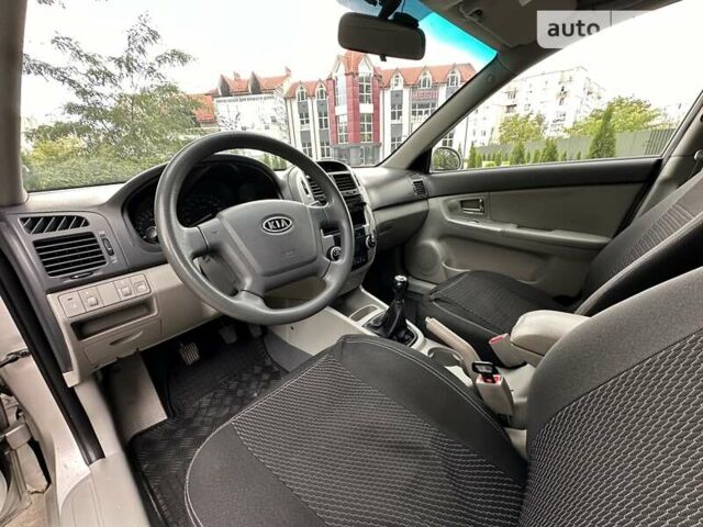 Сірий Кіа Черато, об'ємом двигуна 2 л та пробігом 257 тис. км за 3800 $, фото 14 на Automoto.ua