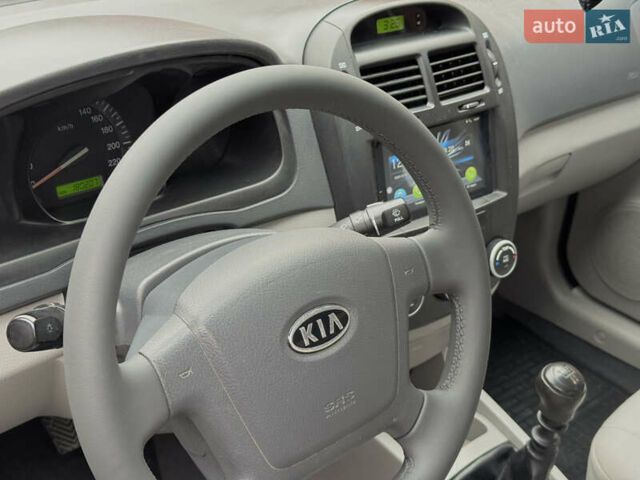 Серый Киа Черато, объемом двигателя 1.6 л и пробегом 180 тыс. км за 4950 $, фото 30 на Automoto.ua