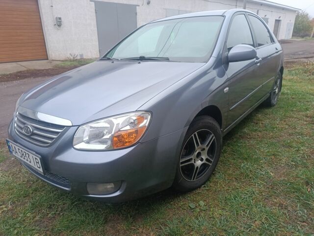 Серый Киа Черато, объемом двигателя 2 л и пробегом 237 тыс. км за 3000 $, фото 2 на Automoto.ua