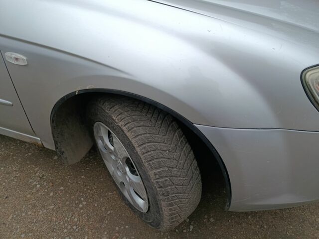 Сірий Кіа Черато, об'ємом двигуна 1.6 л та пробігом 270 тис. км за 3600 $, фото 7 на Automoto.ua