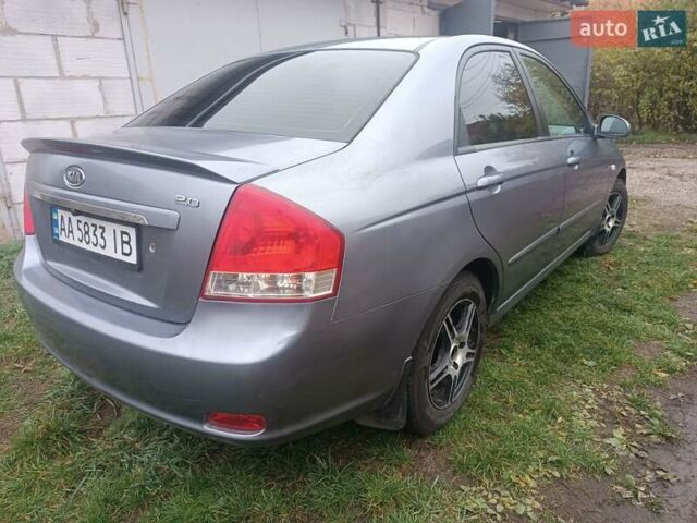 Серый Киа Черато, объемом двигателя 1.98 л и пробегом 230 тыс. км за 3000 $, фото 4 на Automoto.ua