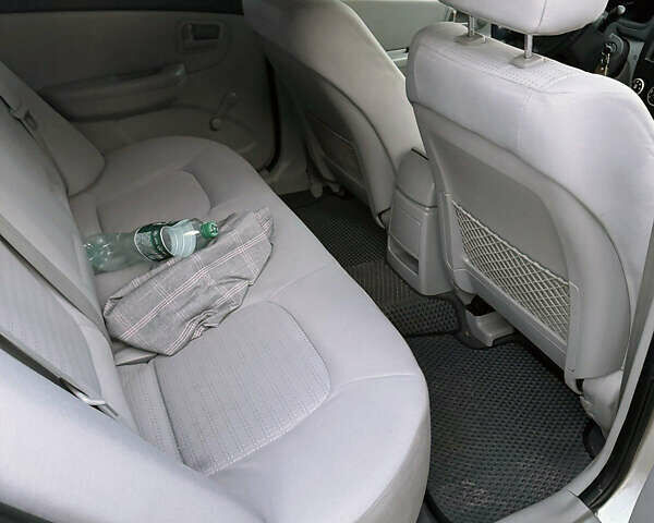 Сірий Кіа Черато, об'ємом двигуна 1.6 л та пробігом 201 тис. км за 5200 $, фото 4 на Automoto.ua