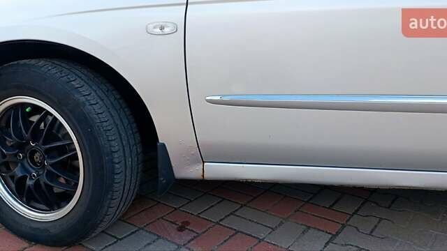 Серый Киа Черато, объемом двигателя 1.6 л и пробегом 250 тыс. км за 5000 $, фото 1 на Automoto.ua