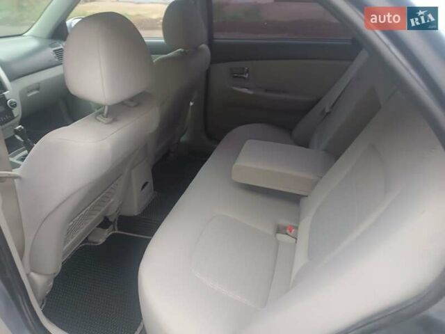 Серый Киа Черато, объемом двигателя 1.98 л и пробегом 230 тыс. км за 3000 $, фото 10 на Automoto.ua