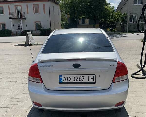 Серый Киа Черато, объемом двигателя 1.6 л и пробегом 210 тыс. км за 3800 $, фото 2 на Automoto.ua