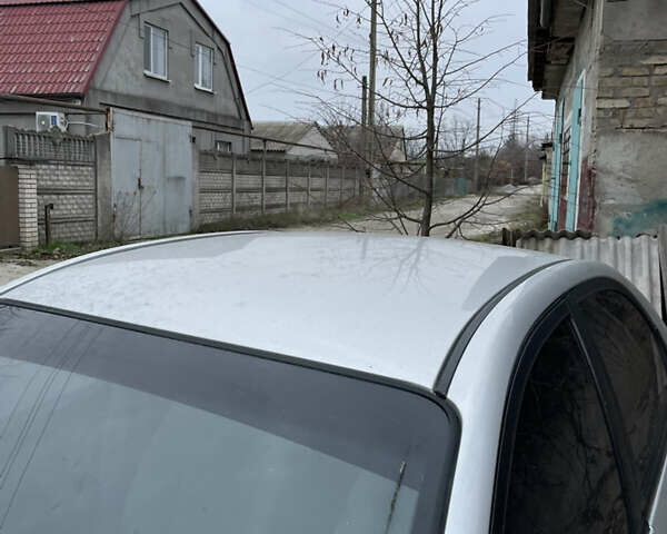 Серый Киа Черато, объемом двигателя 1.6 л и пробегом 210 тыс. км за 1900 $, фото 6 на Automoto.ua