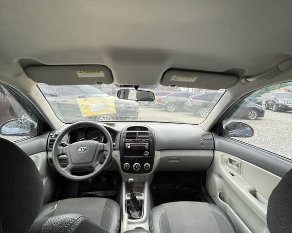 Серый Киа Черато, объемом двигателя 1.59 л и пробегом 144 тыс. км за 4700 $, фото 8 на Automoto.ua