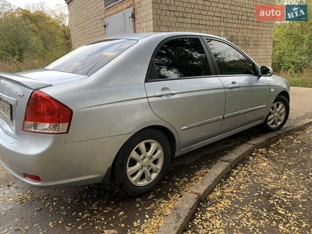 Сірий Кіа Черато, об'ємом двигуна 2 л та пробігом 199 тис. км за 5099 $, фото 2 на Automoto.ua